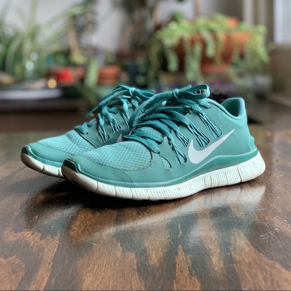 Nike teal green free 5.0 size 7